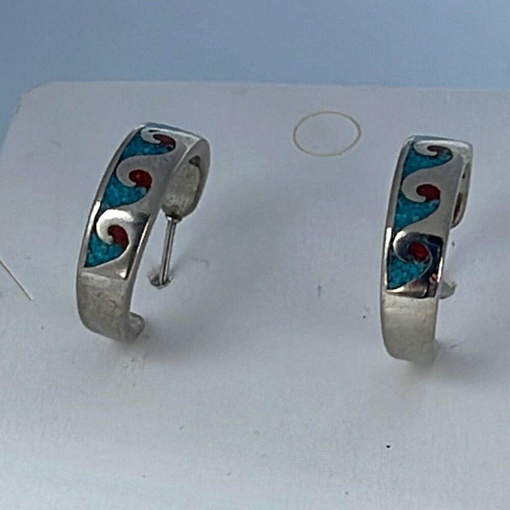 Boutique brand crushed turquoise coral stainless steel earrings.